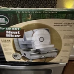 Lem 7-1/2" Electric Meat Slicer 130W Stainless Steel Blade Aluminum. Fixed Price $80.00.