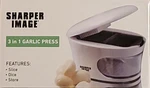 Sharper Image 3-IN-1 Garlic Press Slice-dice-store Brand New/sealed Box. Fixed Price $12.00.