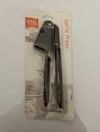 Good Cook Vintage Garlic Press Kitchen Tool With Black Handles. Fixed Price $10.00.