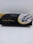 Global Home Stainless Steel Garlic Press & Peeler Set Kitchen Gadgets, New. Fixed Price $16.25.