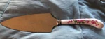 Gentry Cake Server-sign Sheffield England/stainless Steel/porcelain Handle 10.5. Fixed Price $8.00.