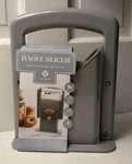 New Bagel Slicer By Gourmet Kitchen Guillotine Style Safety Shield Cutter 9"X7". Fixed Price $17.00.