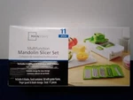 Mainstays Multi-function Mandolin Slicer Set 11 Pieces Stainless Steel Blades. Fixed Price $24.22.