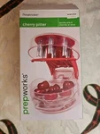 Progressive Prepworks Cherry Pitter: Pits 6 Cherries At Once. Fixed Price $9.00.