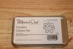 The Pampered Chef Mini Creative Cutters Set #1095 Of 8 Storage Tin New. Fixed Price $17.91.