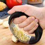 Stainless Steel New Garlic Press Household Manual Device Squeezer Kitchen Tool. Fixed Price $8.99.