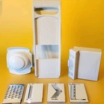 Pampered Chef Ultimate Mandoline #1109 Slicer Grater 4 Blades Open Box - Mint. Fixed Price $29.97.