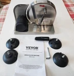 Vevor Manual Bread Slicer 0-0.6" Adjustable Thickness Hand-cranked. Fixed Price $51.99.