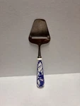 Holland Cheese Slicer Windmill Porcelain Handle White Blue Vintage 9.5. Fixed Price $14.98.