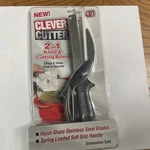 Clever Cutter, 2 1 Knife/cutting Board, Dishwasher Safe, New, Stainless Steel. Fixed Price $15.00.