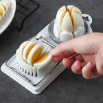 2 1 Stainless Steel Egg Cutter Multifunction Kitchen Slicer Tool. Fixed Price $9.03.