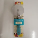 The Pioneer Woman Frontier Collection 4" Stainless Steel Blade Teal Pizza Cutter. Fixed Price $16.99.