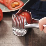 Handheld Fruit & Vegetable Slicer Orange, Lemon, Tomato Onion Cutter. Fixed Price $29.99.
