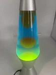 The Original Lava Lamp Silver Base Blue Liquid Yellow Wax 14.3 E65440 2124. Fixed Price $28.00.