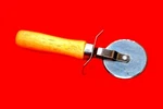 Good Cook Pizza Cutter Stainless Steel Blade Large Wood Handle. Fixed Price $9.49.