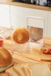 The Prepara Bagel Slicer Makes. Stainless Steel Blade And Stable Base. Fixed Price $14.00.