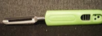 Farberware Swivel Peeler W/ Bean Slicer Green. Fixed Price $11.99.