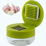 Manual Garlic Press Ginger Crusher Vegetable Slicer Peeler Small Kitchen Tool. Fixed Price $12.99.