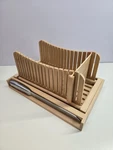 Bamboo Bread Slicer With Crumb Catcher Tray & Serrated Knife Bambusi. Fixed Price $19.97.