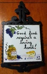 Vintage Violetiles Good Food Requires Loving Hand Cast Iron Ceramic Trivet. Fixed Price $19.95.
