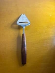 Vintage Norwegian Teak Cheese Slicer Norway Stainless Steel Wooden Handle 8.5". Fixed Price $12.00.