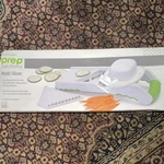 Progressive Multi Slicer Adjustable Vegetable Fruit Hand Guard White Green. Fixed Price $14.99.