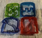 3 Kid Munchkin Silly Sandwich Cutters & 1 Evriholder Flipper Bytes Removes Crust. Fixed Price $17.95.
