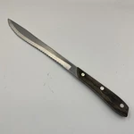 Kitchen Delite Knife Stainless Steel Slicer Serrated Edge Wooden Handle. Fixed Price $10.00.