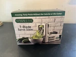 Spiralizer 7-BLADE Vegetable & Fruit Slicer -amazing Tasty Healthy Meals. Fixed Price $10.00.
