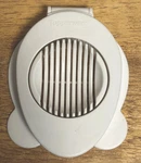 Vintage Tupperware White Egg Slicer. Fixed Price $22.00.