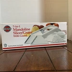 Norpro 7-IN-1 Mandoline Slicer/grater/shredder With Guard #307. Fixed Price $17.50.