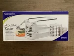 Progressive Vegetable Cutter GPC-2549, Blade Sizes, Metal & White Plastic. Fixed Price $8.50.