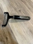Kitchenaid Cheese Slicer Classic 4" Wide Wire Black And Silver. Fixed Price $10.00.