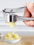 1PC Stainles Steel Garlic Press Crusher Ginger Juicer Mincer Masher Kitchen Tool. Fixed Price $8.00.