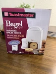 Toastmaster Automatic Bagel Slicer Electric White Great Condition. Fixed Price $25.00.