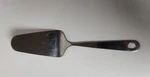 America Cooks Stainless Steel Cake Pie 10" Slicer Server. Fixed Price $8.00.