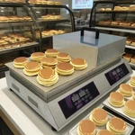 Preasion Electric Dorayaki Baker Pancake Maker Souffle Making Machine 110V. Fixed Price $638.78.