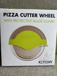 New!kitchy Pizza Cutter Wheel With Protective Blade Guard, Super Sharp. Fixed Price $15.00.