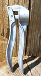 Vintage Cast Aluminum 6-3/8" Long Simplex Garlic Press. Italy. Fixed Price $7.00.