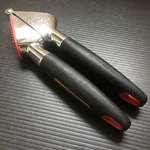 Farberware Stainless Steel Garlic Press With Soft Grip Handles. Fixed Price $12.99.