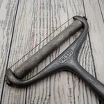 Vintage Presto Cheese Slicer Aluminum Roller Wire Handheld Metal Cutter. Fixed Price $19.94.