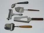 Unique Kitchen Cheese Slicer Cutter And Spoon Lot. Fixed Price $9.99.