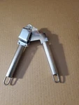 Stainless Steel Garlic Press Household Masher. Fixed Price $16.00.