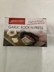 Kitchen Gadget Garlic Roller Rocker Stainless Steel, Chef Presser. Fixed Price $6.00.