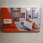 Bread Slicer W/ Adjustable Guide & Crumb Tray Machine Washable Easy Kitchen Tool. Fixed Price $19.95.