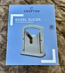Crofton Bagel Slicer White Dishwasher Safe 8.75X7X3 Stainless Steel Blade. Fixed Price $24.99.