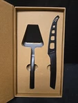 2PC Black Cheese Knife & Slicer Peeler Set Made With Stainless Steel. Fixed Price $24.99.