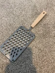 Vintage Ekco Stainless Steel Flat Grater Kitchen Tool Beige Handle. Fixed Price $15.00.