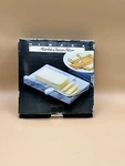 Vintage 1980S Himark Marble Cheese Slicer. Fixed Price $29.88.