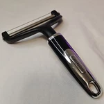 Farberware Manual Cheese Slicer Black Silver Plastic Metal Less Than 10 In. Fixed Price $10.00.